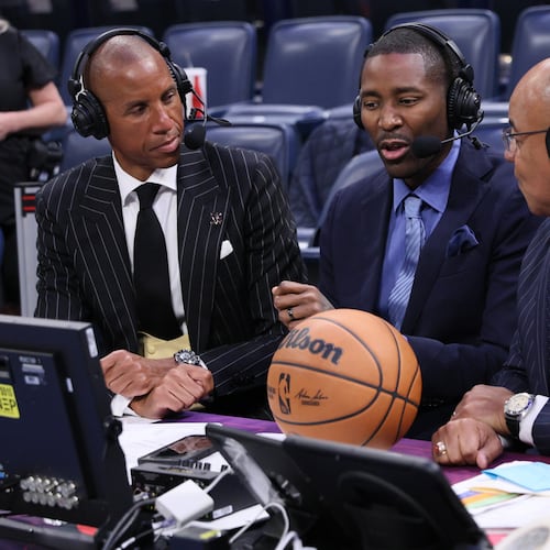 NBC Sports broadcasters, from left, Reggie Miller, Jamal Crawford and Mike Tirico talk after an NBA basketball game between the Houston Rockets and Oklahoma City Thunder, Tuesday, Oct. 21, 2025, in Oklahoma City. (AP Photo/Nate Billings)