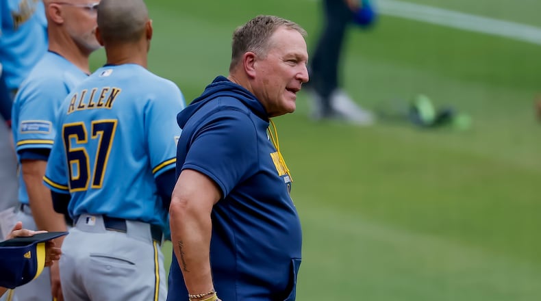 Milwaukee Brewers manager Pat Murphy stands for the US national anthem before a baseball game against the Atlanta Braves, Friday, June 19, 2026, in Atlanta. (AP Photo/Erik S. Lesser)