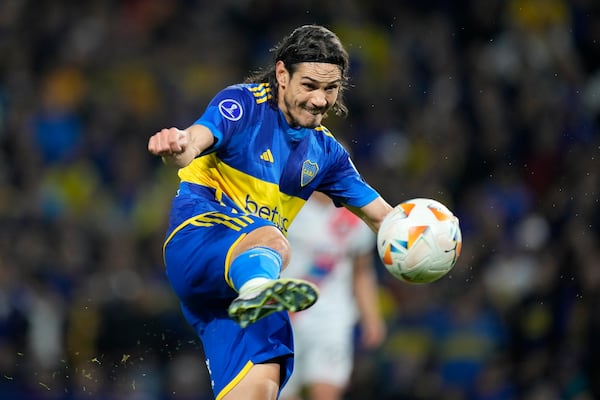 FILE - Edinson Cavani of Argentina's Boca Juniors strikes the ball during a Copa Sudamericana Group D soccer match against Bolivia's Nacional Potosi at La Bombonera stadium in Buenos Aires, Argentina, Wednesday, May 29, 2024. (AP Photo/Natacha Pisarenko, File(