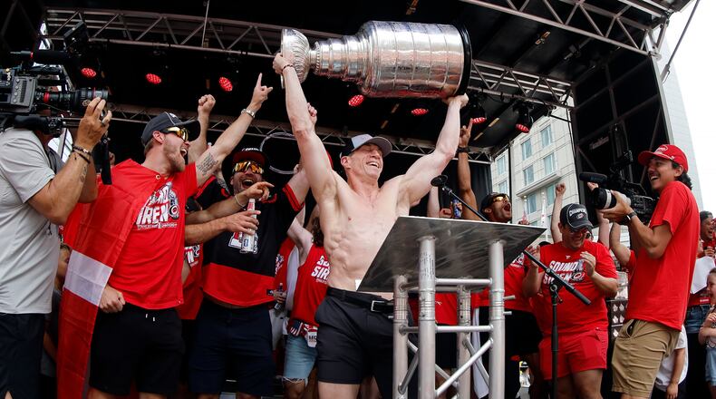 Carolina Hurricanes head coach Rod Brind'Amour holds the Stanley Cup during the NHL hockey club's championship celebration in Raleigh, N.C., Saturday, June 20, 2026. (AP Photo/Karl DeBlaker)