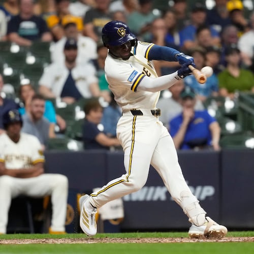 Milwaukee Brewers' Luis Lara hits a three-run home run for his first career home run during the eighth inning of a baseball game against the Seattle Mariners, Tuesday, Aug. 18, 2026, in Milwaukee. (AP Photo/Aaron Gash)