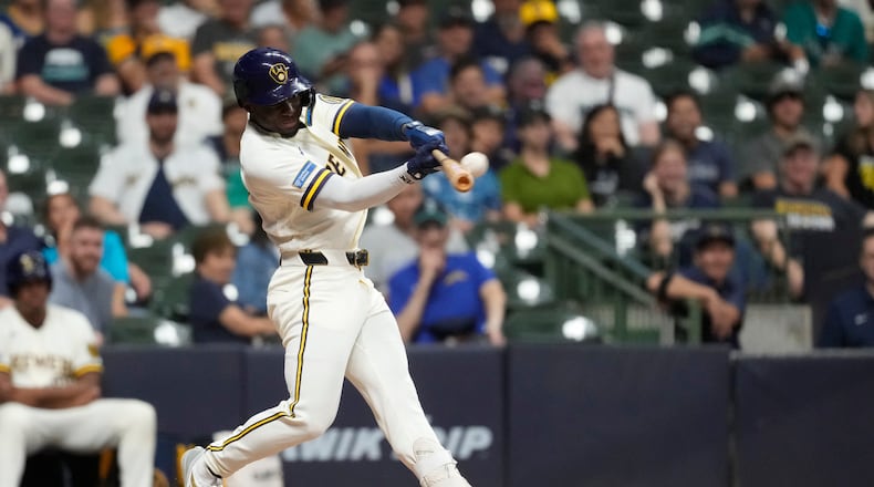Milwaukee Brewers' Luis Lara hits a three-run home run for his first career home run during the eighth inning of a baseball game against the Seattle Mariners, Tuesday, Aug. 18, 2026, in Milwaukee. (AP Photo/Aaron Gash)