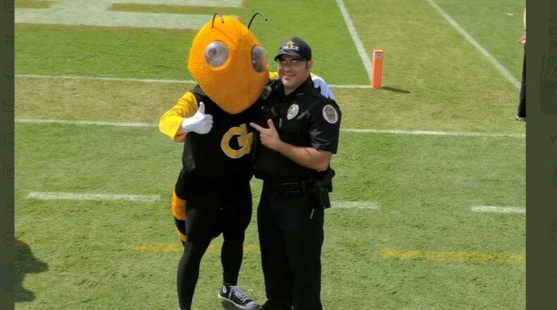 Georgia Tech police officer James Cornacchia, pictured right, died Monday from COVID-19, school officials said. He served for nearly 20 years. PHOTO CONTRIBUTED.