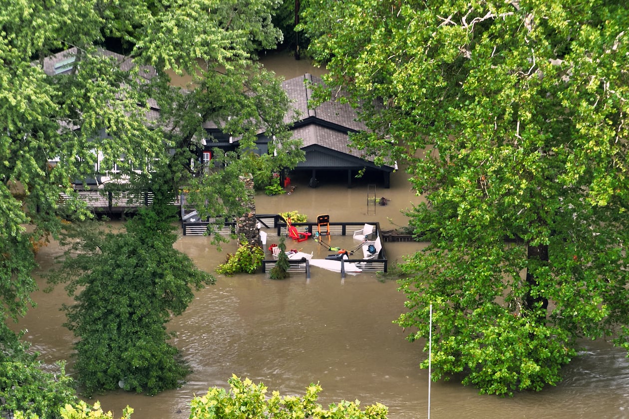 This aerial photo provided by the Indianapolis Fire Department shows flooding in northern Indianapolis, Ind., Saturday, Aug. 15, 2026. (Indianapolis Fire Department via AP)