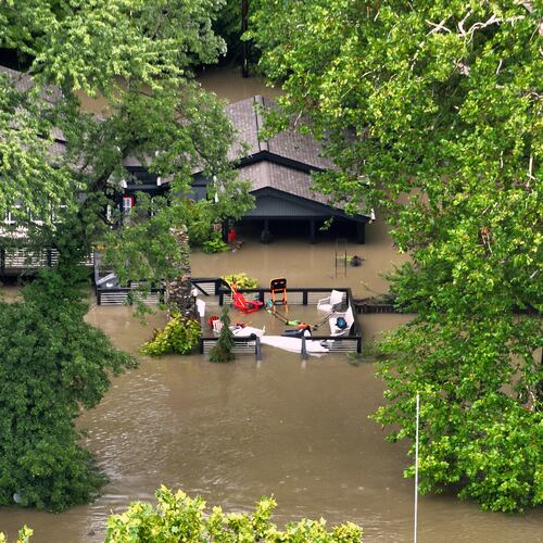 This aerial photo provided by the Indianapolis Fire Department shows flooding in northern Indianapolis, Ind., Saturday, Aug. 15, 2026. (Indianapolis Fire Department via AP)
