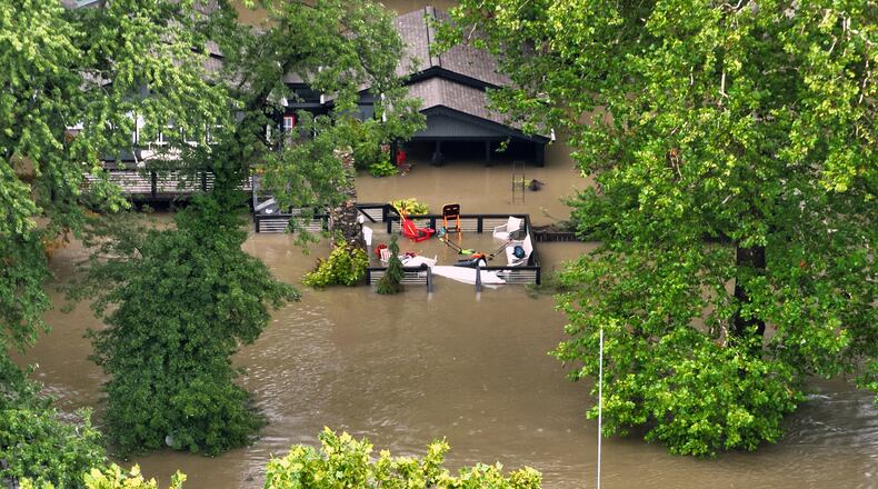 This aerial photo provided by the Indianapolis Fire Department shows flooding in northern Indianapolis, Ind., Saturday, Aug. 15, 2026. (Indianapolis Fire Department via AP)