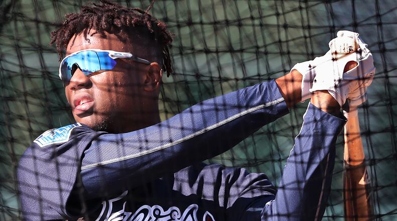 Ronald Acuna has been arguably the best player in the Grapefruit League this spring. He was reassigned to minor league camp by the Braves on Monday. (Curtis Compton/ccompton@ajc.com)
