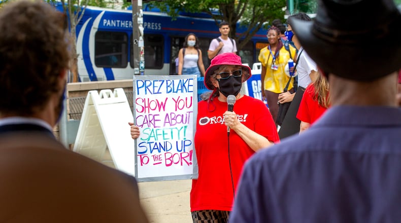 Georgia State University professor Wendy Simonds talks to the crowd during a protest for stronger COVID-19 safety protocols  Monday, August 30, 2021. STEVE SCHAEFER FOR THE ATLANTA JOURNAL-CONSTITUTION