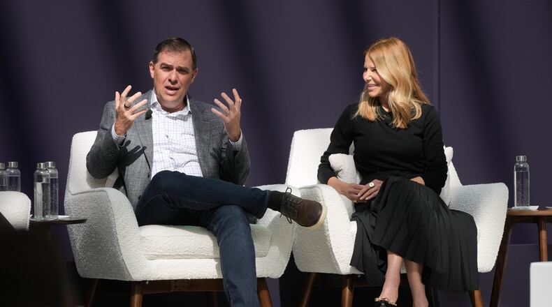Matt Garman, CEO of AWS, left, speaks next to Denise Dresser, chief revenue officer of OpenAI, at a What's Next with AWS event Tuesday, April 28, 2026, in San Francisco. (AP Photo/Jeff Chiu)