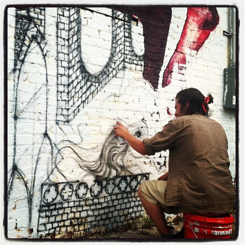 Artists from around the world paint murals around Atlanta
