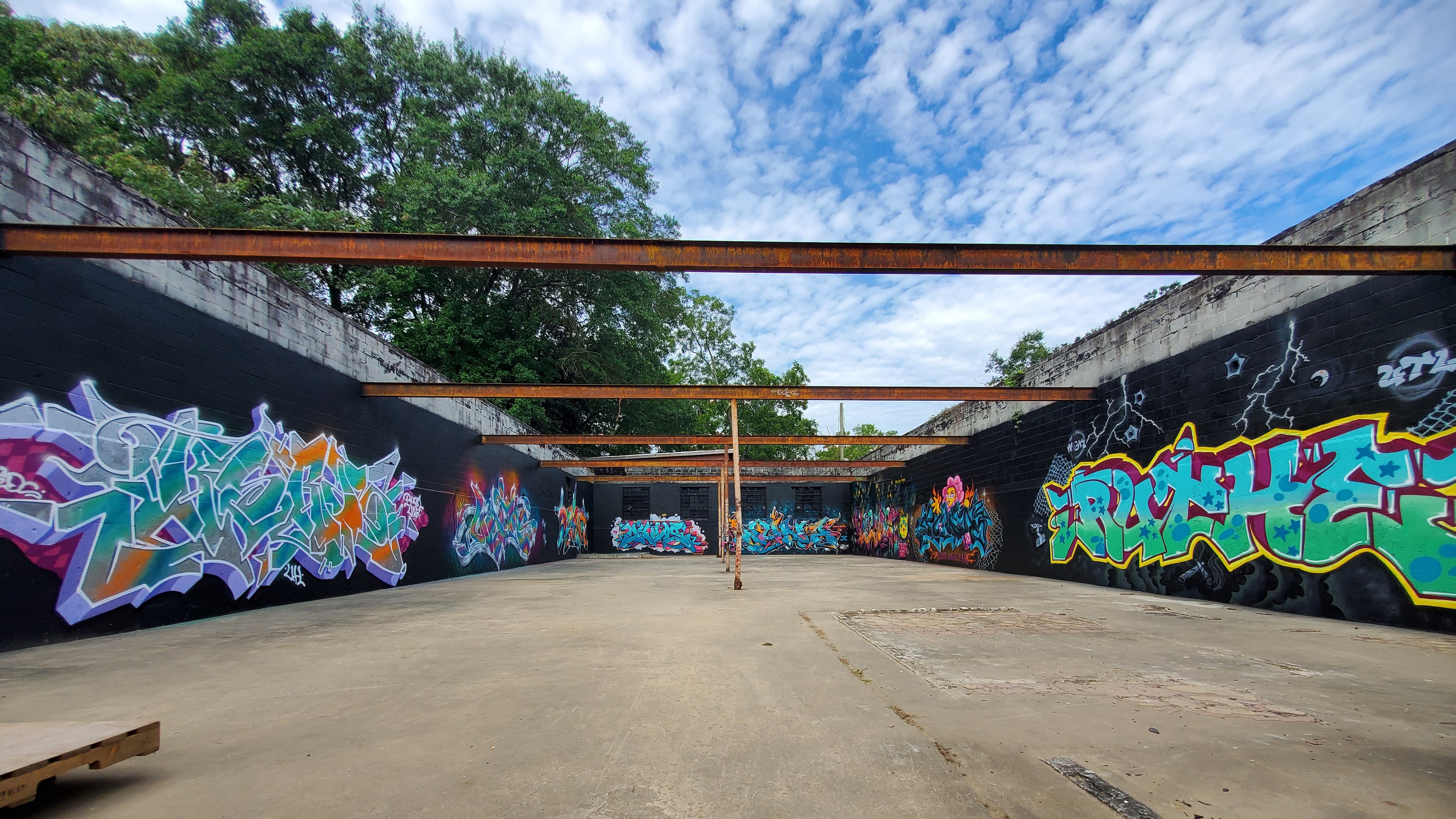 The building shell, at 1141 Allene Ave. SW in the Oakland City neighborhood, hosted a Queens of Style invitational featuring eight female style writers from Atlanta, the U.S. and Europe. The works remain on view from the sidewalk daily. (Courtesy of Arthur Rudick)