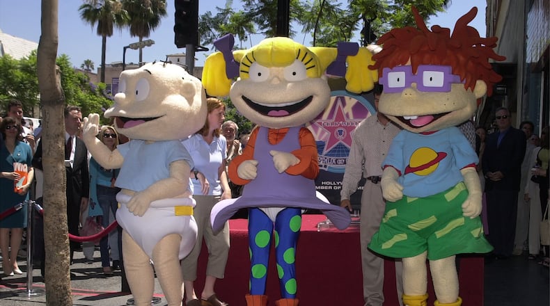 'Rugrats' characters, from left, Tommy Pickles, Angelica and Chuckie Finster attend a ceremony honoring the animated children''s show 'Rugrats' with a star on the Hollywood Walk Of Fame June 28, 2001 in Hollywood, CA. (Photo by Vince Bucci/Gettty Images)
