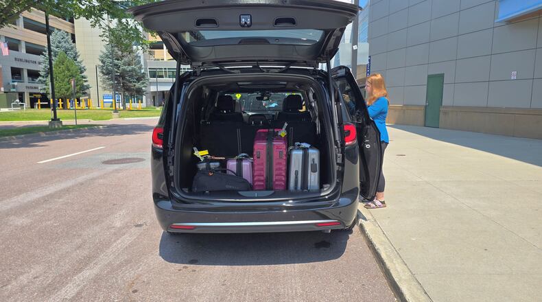 Luggage fills the cargo area of a 2027 Chrysler Pacifica at Burlington International Airport in Vermont before Chris Hardesty's family road trip home to Georgia. (Chris Hardesty/Cox Automotive)