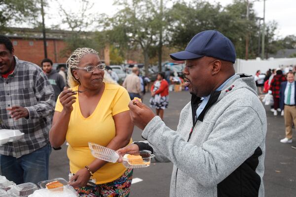 Savannah Mayor Van Johnson tries a slice of pie on Wednesday during the annual Union Mission Savannah Thanksgiving event.