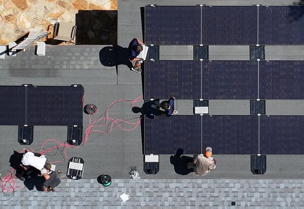 A highly satisfying bird's-eye photo of a solar panel installation. 
