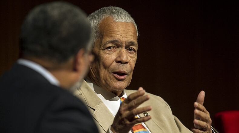 APRIL 09, 2014 - Julian Bond, former Chairman, NAACP, right, looks over towards Lonnie G. Bunch, III, moderator, during the panel discussion, Heroes of the Civil Rights Movement: Views from the Front Line, held at the the Civil Rights Summit at the Lyndon Baines Johnson Library and Museum in Austin, Texas, on Wednesday, April 9, 2014. The LBJ Library and Museum celebrated the fiftieth anniversary of the Civil Rights Act of 1964 passage. (RODOLFO GONZALEZ / AMERICAN-STATESMAN)