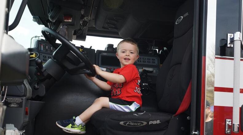 Touch-A-Truck events are rolling into Roswell and Johns Creek on Saturday, giving kids and adults alike the chance to explore police, fire and construction vehicles.