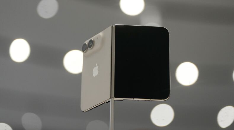 The iPhone Duo is displayed during an announcement of new products on Wednesday, Sept. 9, 2026, on the Apple campus in Cupertino, Calif. (AP Photo/Jeff Chiu)