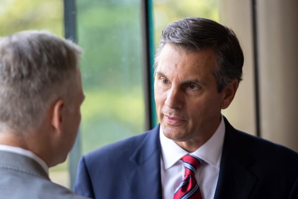 Republican U.S. Senate candidate Derek Dooley will campaign Saturday at the University of Georgia football tailgate alongside supporter Gov. Brian Kemp. (Arvin Temkar/AJC)