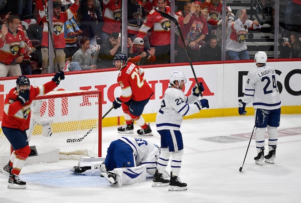 Florida Panthers center Carter Verhaeghe (23) celebrates after scoring during the first period of Game 4 of a second-round NHL hockey playoff series against the Toronto Maple Leafs, Sunday, May 11, 2025, in Sunrise, Fla. (AP Photo/Michael Laughlin)
