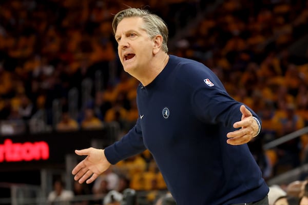 Minnesota Timberwolves head coach Chris Finch gestures to his team during the first half of Game 4 in the Western Conference semifinals of the NBA basketball playoffs against the Golden State Warriors, Monday, May 12, 2025, in San Francisco. (AP Photo/Jed Jacobsohn)
