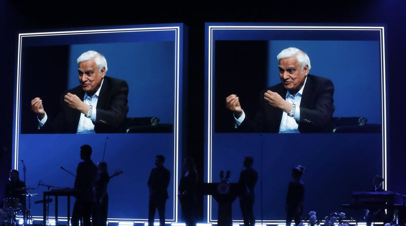 More than 300 people, including Vice President Mike Pence, attended a memorial service at Passion City Church for evangelist and Christian apologist Ravi Zacharias (shown on screen) on Friday, May 29, 2020, in Atlanta. AP PHOTO / BRYNN ANDERSON