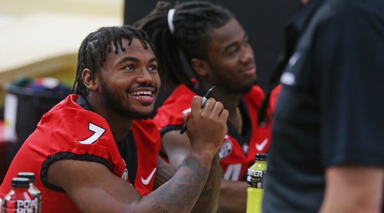 University of Georgia running back D'Andre Swift chats with a fan at UGA’s Fan Day on Aug. 3, 2019. Christina Matacotta/Christina.Matacotta@ajc.com