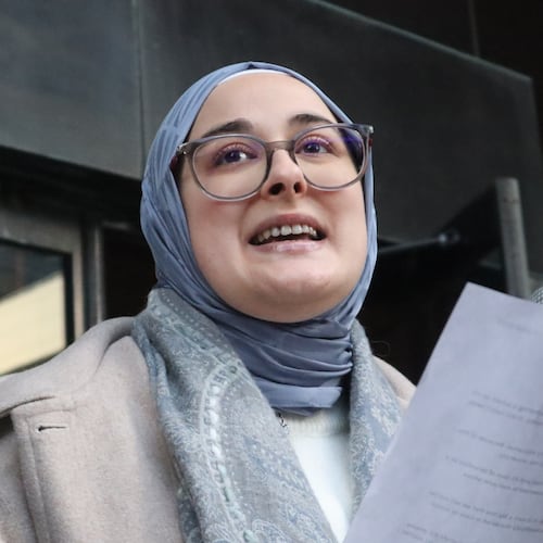 Tufts University doctoral student Rumeysa Ozturk reads from a prepared statement following a court hearing outside the John Joseph Moakley United States Courthouse Thursday, Dec. 4, 2025, in Boston. (AP Photo/Leah Willingham)