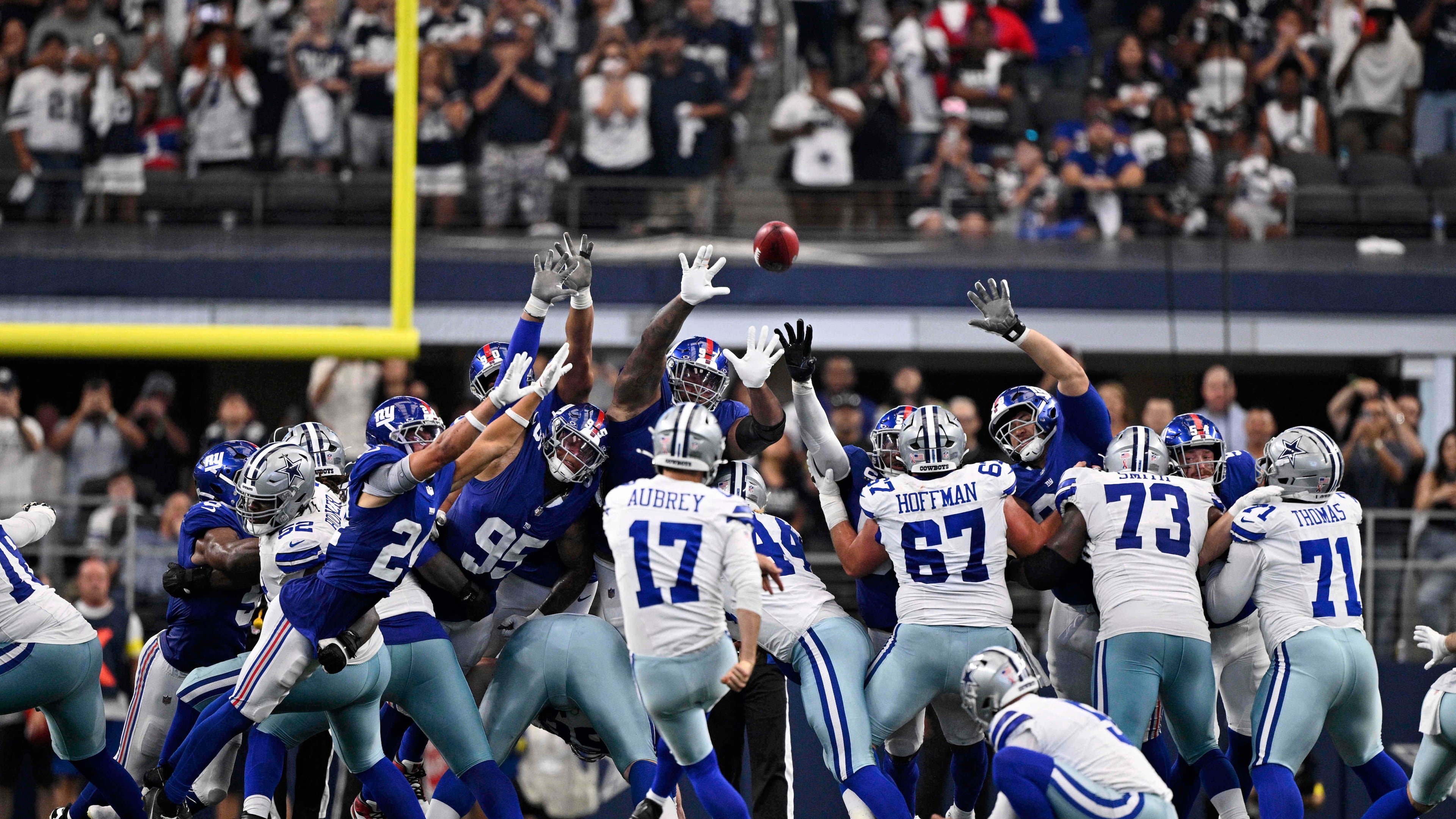 Dallas Cowboys place kicker Brandon Aubrey (17) kicks a game-winning field goal against the New York Giants in overtime of an NFL football game Sunday, Sept. 14, 2025, in Arlington, Texas. (AP Photo/Jerome Miron)
