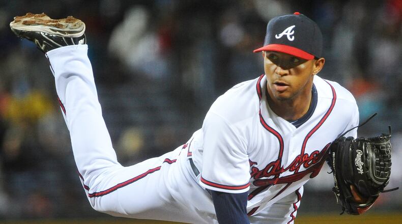 Braves relief pitcher Anthony Varvaro (59) pitches against the Mets during a baseball game, Friday, Sept. 16, 2011, in Atlanta.