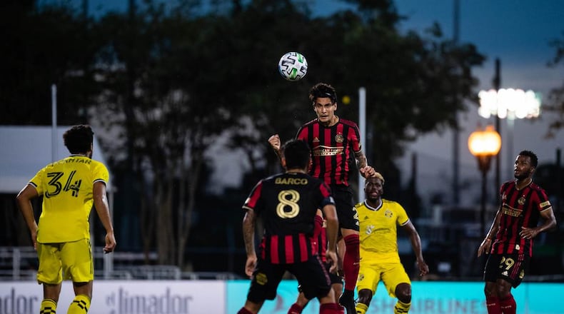 Atlanta United's Franco Escobar clears the ball during 1-0 loss to Columbus Tuesday, July 21, 2020, in the MLS tournament in Orlando, Fla.
