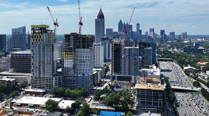 Aerial photo shows constructions of high-rises in midtown, Friday, July 7, 2023, in Atlanta. As fears of a recession persist but have yet to be realized, U.S. employers added 209,000 jobs in June, the Labor Department reported Friday. The unemployment rate was 3.6%, compared with 3.7% in May. (Hyosub Shin / Hyosub.Shin@ajc.com)