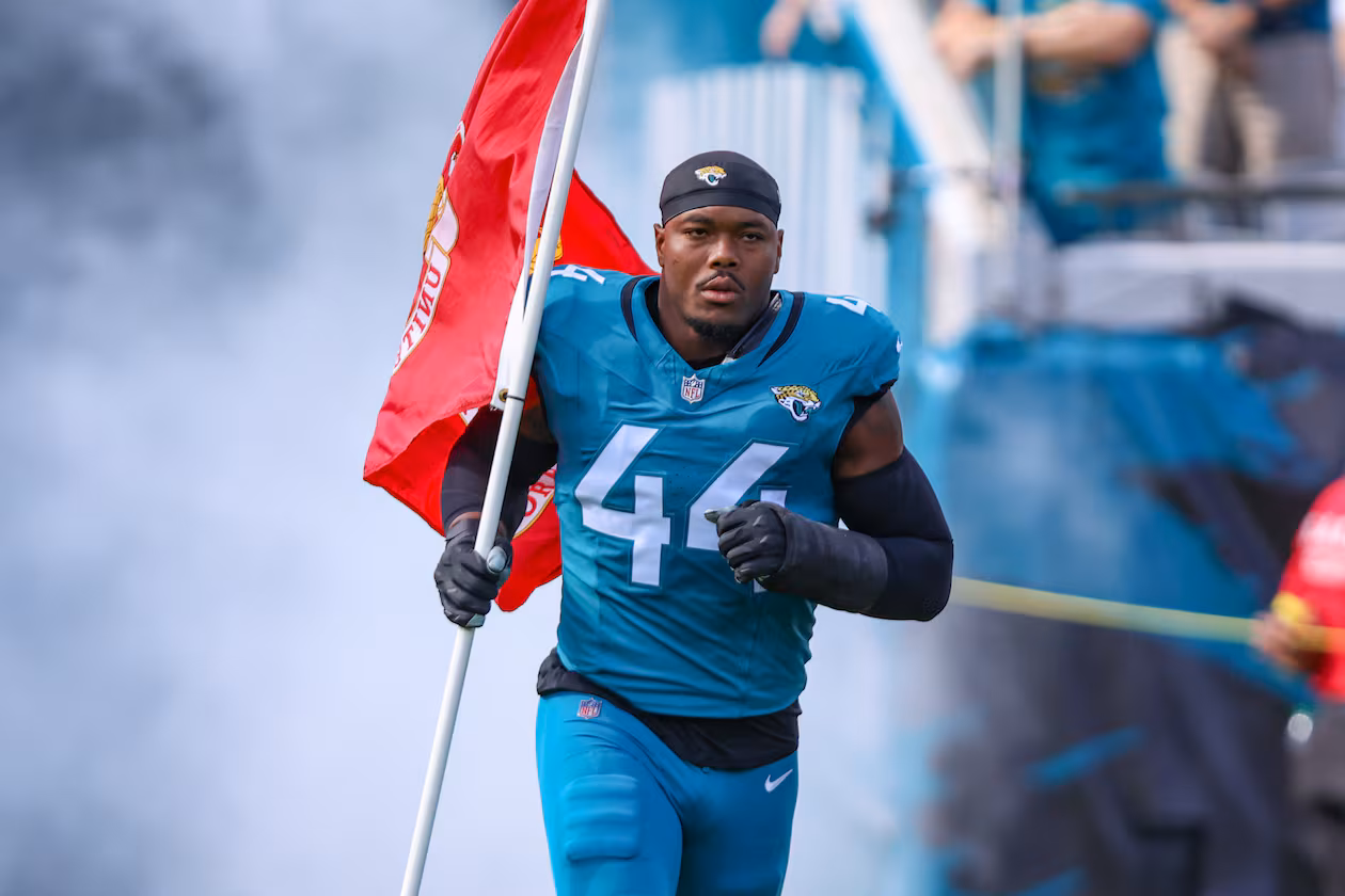 Jacksonville Jaguars defensive end Travon Walker (44) runs onto the field for an NFL football game against the Los Angeles Chargers, Sunday, Nov. 16, 2025, in Jacksonville, Fla. (AP Photo/Gary McCullough)