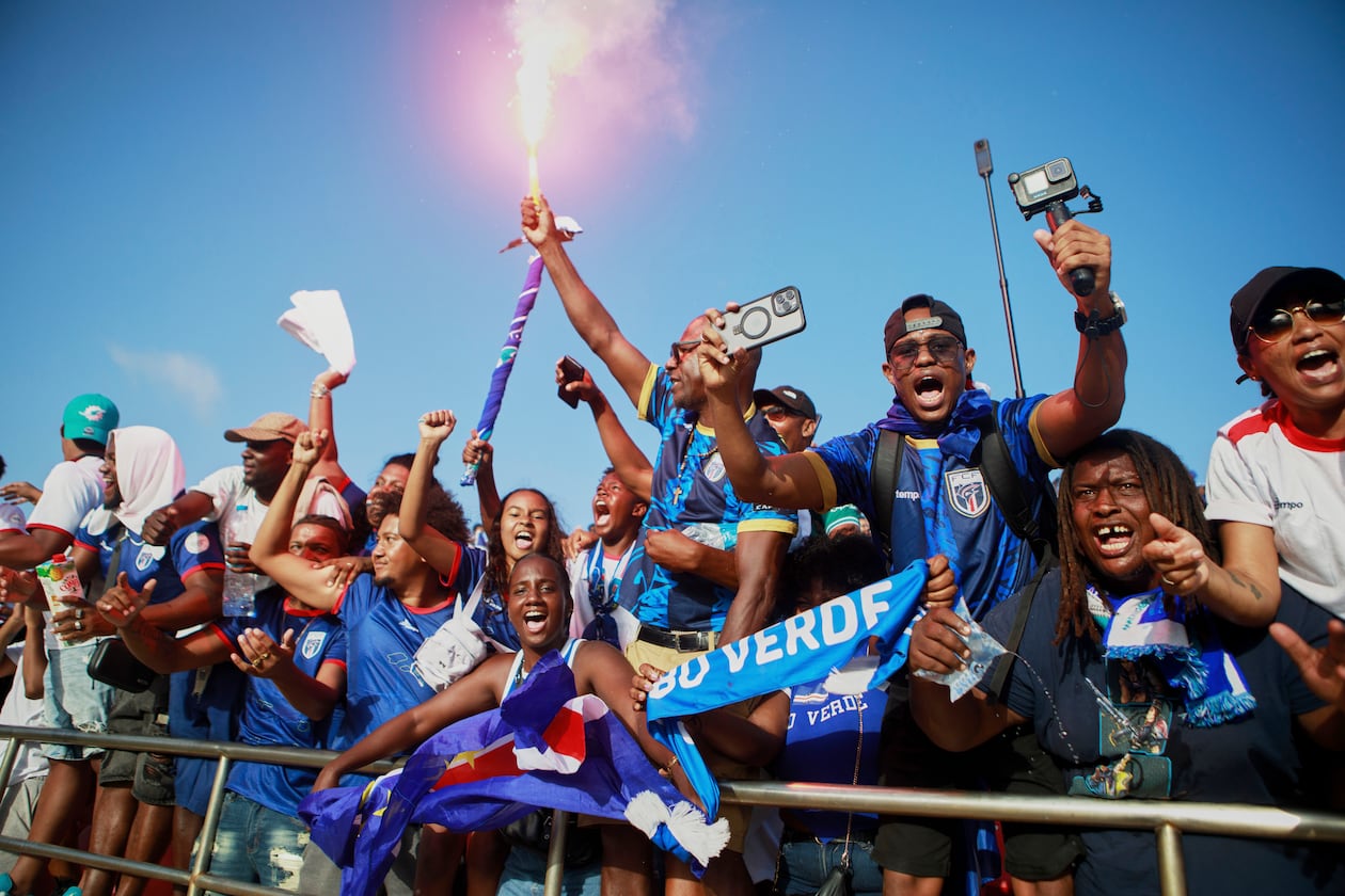 Fans celebrate after Cape Verde defeated Eswatini in a World Cup qualifying match Oct. 13 to clinch their qualification for the 2026 World Cup. (Cristiano Barbosa/AP)