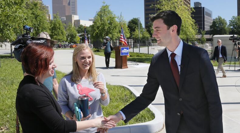 Democrat Jon Ossoff shakes hands with supporters Wednesday after he held a press conference in Liberty Plaza, across from the Capitol. Saying that “cutting waste is simply not a partisan issue,” Ossoff made a pitch to reduce federal spending by $16 billion BOB ANDRES /BANDRES@AJC.COM
