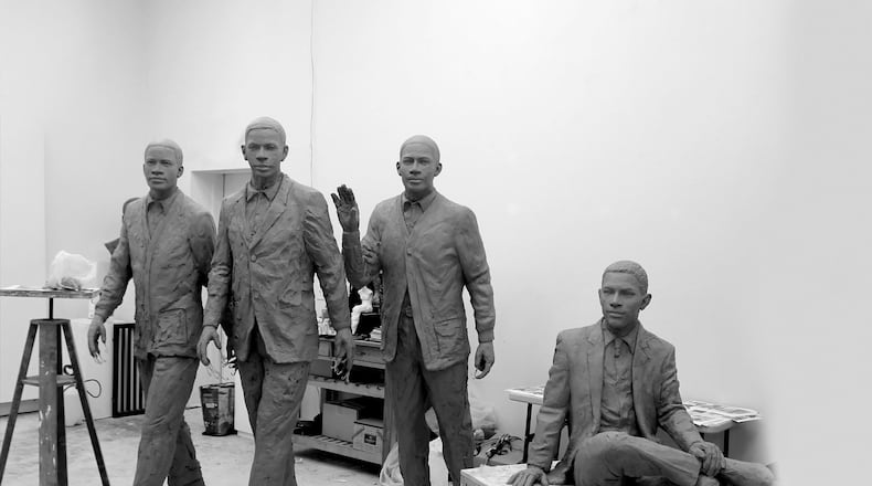 The original clay models of “The Three Pioneers” sculpture, honoring Ralph A. Long Jr., Lawrence Williams and Ford C. Greene, that will be placed in Georgia Tech’s Harrison Square.“The First Graduate,” honoring Ronald Yancey, shows him sitting down. (Courtesy Georgia Tech).