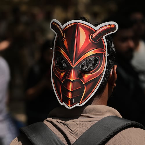 A participant wears a cockroach mask as supporters of the Cockroach Janta Party gather for a protest demonstration in New Delhi, India, Saturday, June 6, 2026. (AP Photo/Manish Swarup)