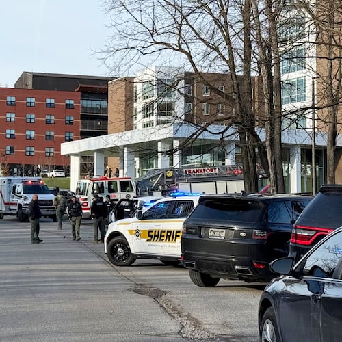 Law enforcement responds to a shooting at Whitney Moore Young Jr. Hall on Kentucky State University's campus in Frankfort, Ky., Tuesday, Dec. 9, 2025. (Hannah Brown/The State Journal via AP)