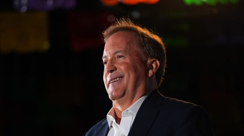 Texas Attorney General Ken Paxton, a Republican candidate for the U.S. Senate, smiles at a campaign event in McKinney, Texas, Tuesday, May 19, 2026. (AP Photo/LM Otero)