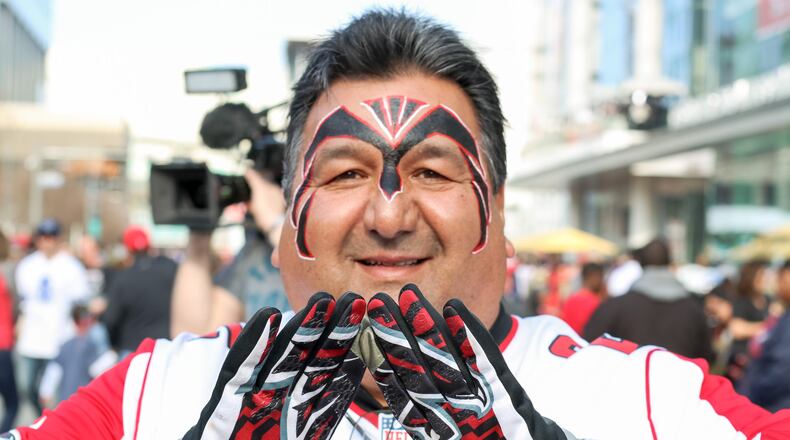 Atlanta Falcons fans have descended upon Houston to celebrate and cheer on the Falcons who will face off against the New England Patriots at Super Bowl 51 on Sunday, February 5. (Janay Kingsberry/AJC)