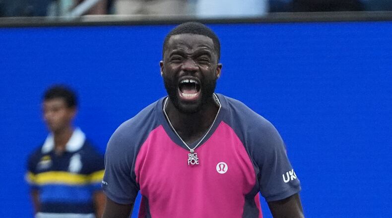 Frances Tiafoe, of the United States, celebrates winning a match against Daniil Medvedev, of Russia, during the fourth round of the U.S. Open tennis championships, Sunday, Sept. 6, 2026, in New York. (AP Photo/Frank Franklin II)