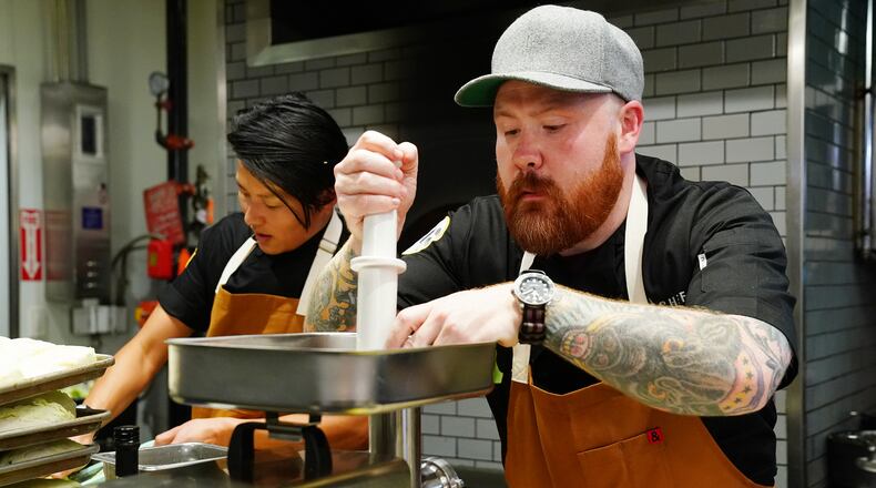 TOP CHEF -- "Get your Phil" Episode 1706 -- Pictured: (l-r) Melissa King, Kevin Gillespie -- (Photo by: Nicole Weingart/Bravo)
