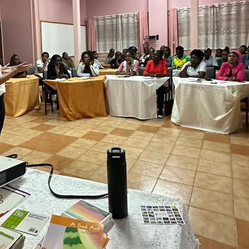 Through teacher training, clinics and ongoing partnerships, educators from KIPP Atlanta Schools are helping their Kenyan colleagues give thousands of students the gift of reading. KIPP reading coach Kristal Peterson conducts one of the clinics. (Courtesy of KIPP Atlanta Schools)