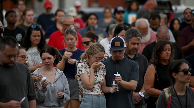Community members and leaders came together during a community candlelight vigil at Jug Tavern Park on Wednesday, Sept. 4, 2024, in Winder. Four people were killed after a shooting at Apalachee High School in Barrow County. (Hyosub Shin / AJC)