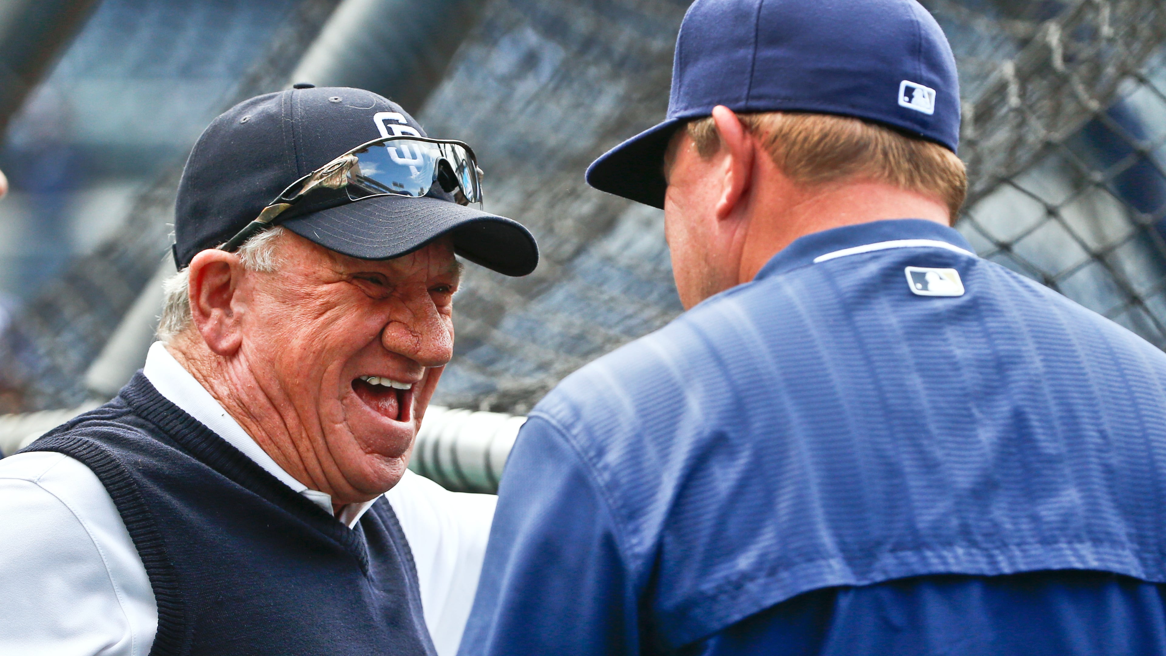 FILE - Former San Diego Padres pitcher Randy Jones, left, laughs while talking with manager Pat Murphy prior to a baseball against the Arizona Diamondbacks in San Diego on June 26, 2015. (AP Photo/Lenny Ignelzi, File)