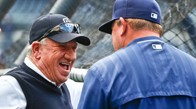 FILE - Former San Diego Padres pitcher Randy Jones, left, laughs while talking with manager Pat Murphy prior to a baseball against the Arizona Diamondbacks in San Diego on June 26, 2015. (AP Photo/Lenny Ignelzi, File)