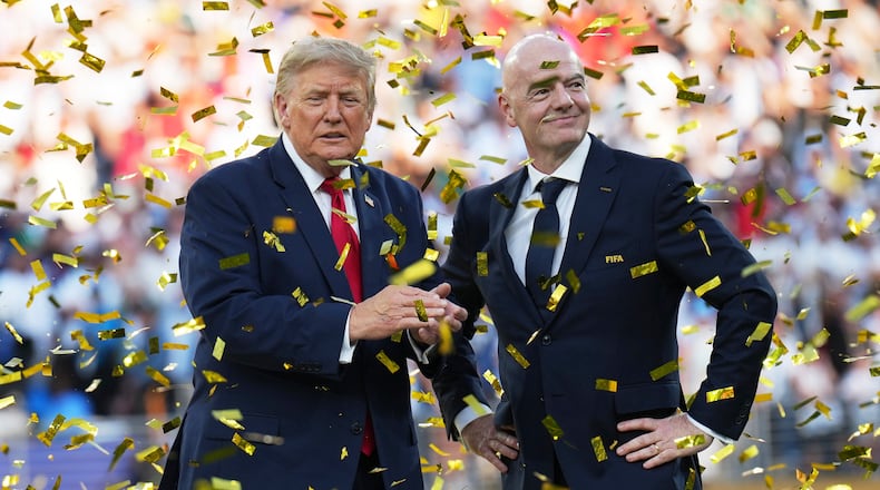President Donald Trump, left, and FIFA President Gianni Infantino watch confetti fall at the conclusion of the World Cup championship final soccer match between Spain and Argentina in East Rutherford, N.J., Sunday, July 19, 2026. (AP Photo/Jacquelyn Martin)