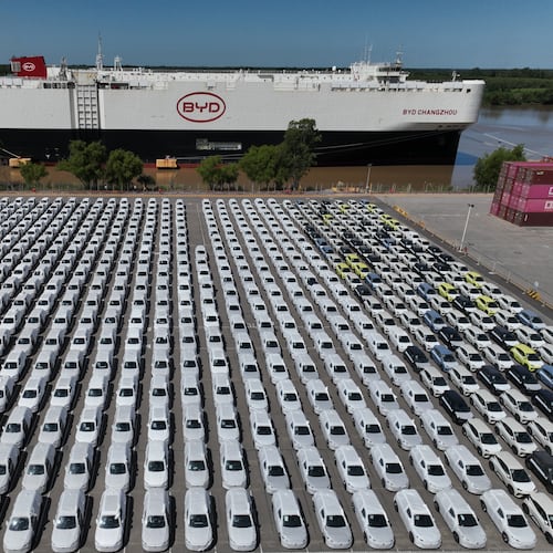 The BYD Changzhou car carrier is docked at Terminal Zarate in the Buenos Aires province of Argentina, Tuesday, Jan. 20, 2026, where hybrid and electric vehicles shipped from China are parked next to the ship. (AP Photo/Victor R. Caivano)