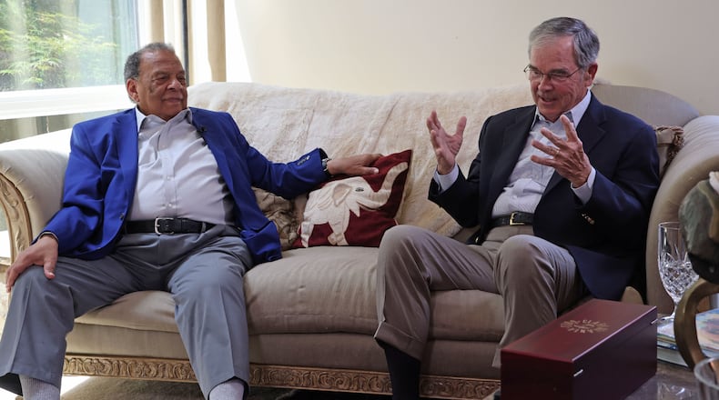 Former U.N. Ambassador Andrew Young and Billy Payne talk with Atlanta Journal-Constitution reporter Steve Hummer about the 25th anniversary of the 1996 Atlanta Olympics. (Tyson Horne / tyson.horne@ajc.com)