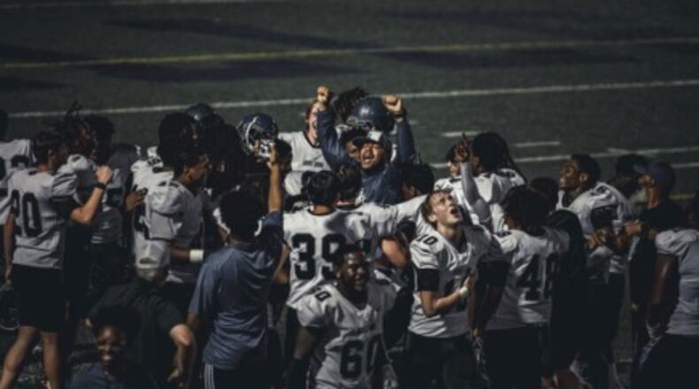 The Locust Grove football team celebrates its victory over King on Sept. 1, 2023.